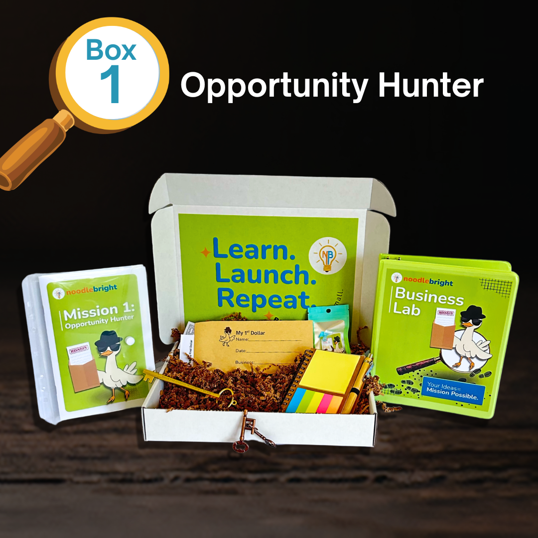 Opportunity Hunter educational business subscription box kit: Mission 1 with various components on a dark background