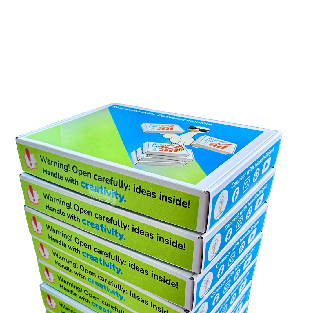 Stack of Noodle Bright business lab subscription boxes with colorful design and text on a white background