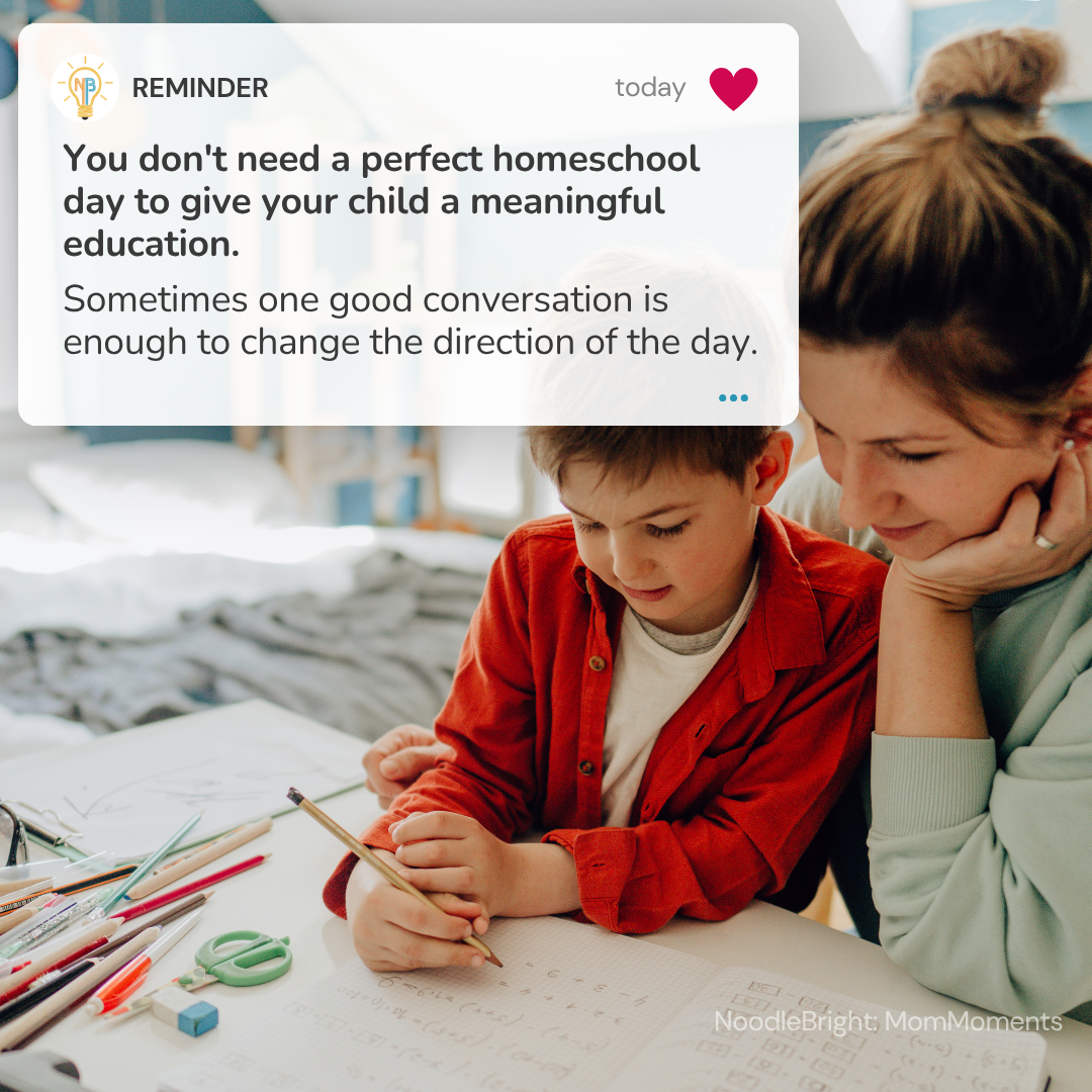 A woman and a young boy sit at a table, with the woman reading a handwritten sheet while the boy writes. A large white text bubble overlays the top-left area with a motivational quote about homeschooling.